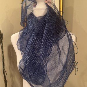 Women's long blue scarf with think white strips with tassels